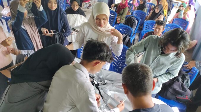 DKV UM Kendari Perkuat Ekonomi Kreatif Desa Lewat Program Desa Binaan di Baini